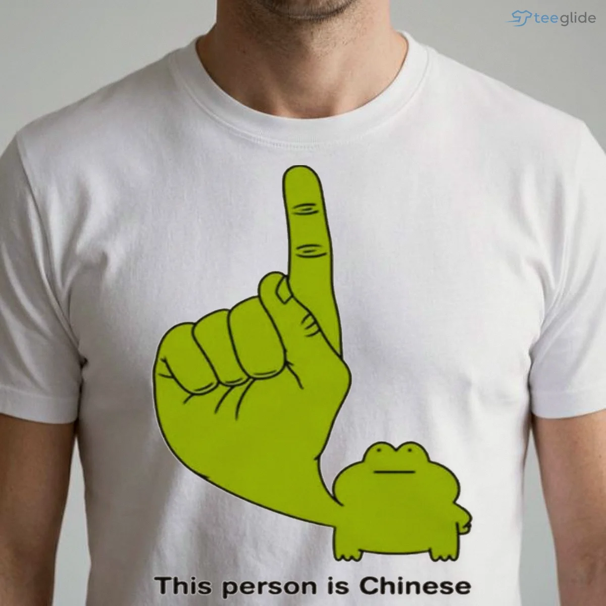 this person is chinese green frog big finger pointing up shirt 1 this person is chinese green frog big finger pointing up shirt 1